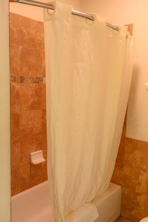 The Symphony Inn & Suites Houston Room photo